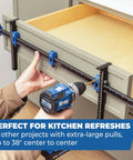Person using Cabinet Hardware Jig Pro XL Flexible Full Length To Compact Setup For Wide Pulls Or Knob Mounts on kitchen drawer