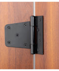 Hard As Nails Black Iron Hinges 4.5 Inch mounted on wooden door, showing rust-proof finish and hardware detail.