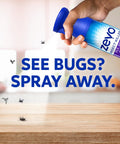 Fast Acting Flying Insect Killer Spray Tough Love Formula For Home Nukes in hand targeting fruit flies and gnats.