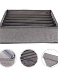 Slick Seven Compartment Folding Fabric Drawer Organizer For Underwear Socks And Hair Accessories To Quick Clean Up Your Bedroom Closet Space Without Any Sweat Or Hassle Today in gray with seven sections.