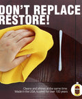 Hand using a yellow cloth to apply Versatile Wood Cleaner And Furniture Polish With Fresh Lemon Oil To Wipe Down Beaten Tables And Buff Hardwood Floors Kitchen Cabinets Leave A Slick Long Lasting Shine 12 Oz Bottle.
