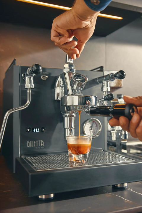 Pouring espresso shot from the Alto Dual Boiler Espresso Machine With PID Control And Flow Adjustment For Top Shelf Precision Shots.