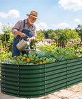 Man watering Outdoor Galvanized Steel Raised Bed For Vegetables And Herbs 6 By 3 By 2 Feet 24 Inch Deep Open Bottom Backyard Garden Planter In Forest Green Sturdy Backyard Grow Bed For Veggies And Fresh Herbs Easy Assembly Weather Resistant