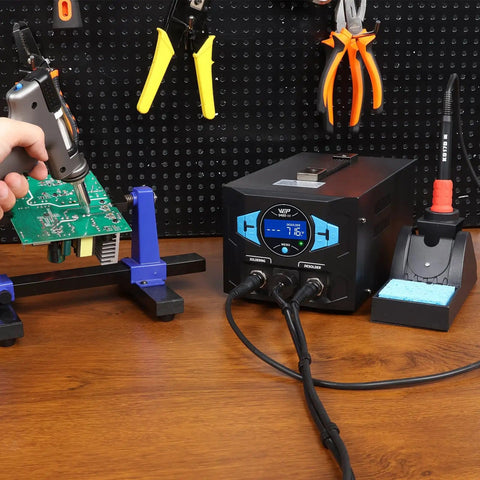 Upgraded 2 In 1 ESD Safe Soldering Desoldering Station setup on workbench with fast heating desoldering gun in use on circuit board