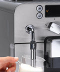 Close-up of Super Automatic Espresso Machine With One Touch Brewing Delivers Solid Daily Grinds And Straight Fire Shots That Hit Different Every Time In A Sleek Silver Body Made For Zero Hassle Home Brewing, showing milk wand and buttons.