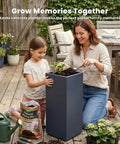 Crack-Resistant Lightweight Concrete Planter, Tall 19.9 Inches, Charcoal Rectangular Plant Pot With Drainage Hole And Rubber Plug in patio setting with mother and daughter planting.
