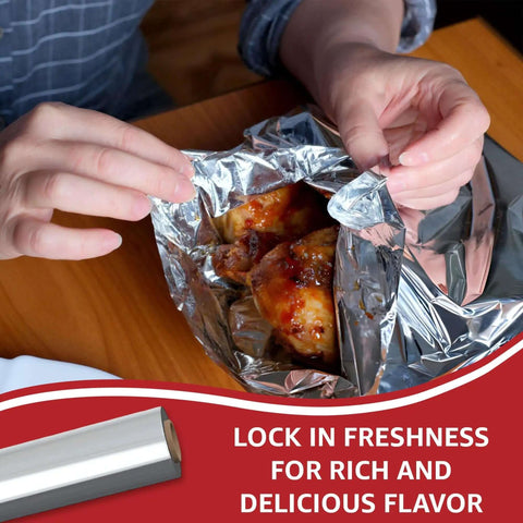 Person wrapping grilled chicken in Heavy Duty 18 Inch Wide Aluminum Foil Roll, 500 Feet, Food Safe, Tear Resistant for Cooking