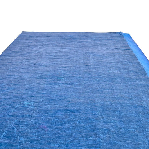 Heavy Duty Floor Underlayment Covers Four Hundred Square Feet showing blue polyethylene layer suitable for laminate and vinyl flooring.