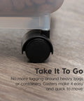 Close-up of caster on Remington Airtight Pet Food Storage Container Holds 22 Lbs showcasing mobility and ease of movement.