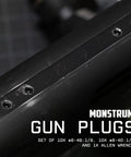 Gun Plug Screw Set For Rifle And Shotgun Receivers That Snaps Into Factory Optics Ports, showing black screws in receiver ports.
