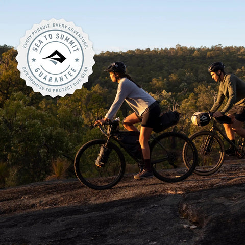 Cyclists in action with Bikepack Dry Bags Set 3.7L Each Waterproof Gear Bags With Stretch Loc Straps For Bikepacking