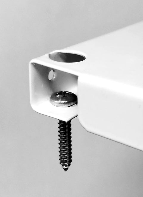 Close-up of screw mounting on Heavy Duty White Steel Pegboard Panels Set Two 32 By 16 Inch For Garage And Home Shop Organization Built Tough Metal Pegboard Wall Mount System For Tool Storage.
