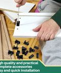 Upgrade Your Cabinetry With These Eight Black False Front Drawer Clips Heavy Duty Plastic Waterproof Design Includes Mounting Screws For No Fuss Swaps That Deliver A Rock Solid Secure Fit Every Day. A person installs black plastic drawer clips on white cabinet panels.