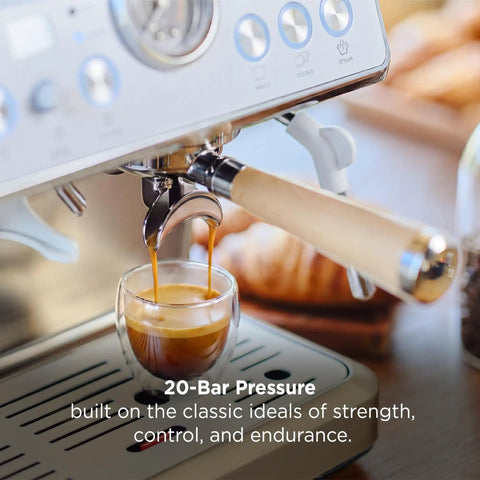 Talos Semi Automatic Grind And Brew Espresso Machine With Built In Conical Burr Grinder pouring espresso into glass cup