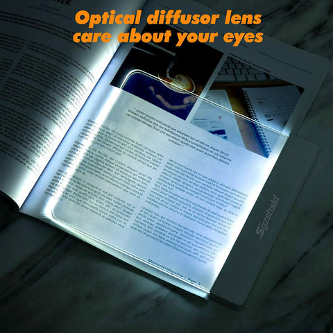 Clip On Book Light Battery Powered Flat Plate Led Lamp With Adjustable Brightness in use for bedtime reading on a book page