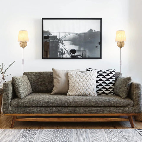 Set of Two Plug in Wall Sconces with On Off Switch Modern Gold Fabric Shade Wall Lamps 6.56ft Cord Plug in or Hardwired Installation Bedroom Bedside Living Room Porch Lighting shown in a living room setting with a sofa