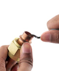 Swivel Head Deburring Tools Set With 5 Inch Aluminum Handle, Hardened Steel Blades in use on copper pipe