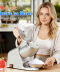 Top Shelf Heavy Duty Electric Ice Crusher And Shaver With A Beefy 300W Motor Powering Through Up To 186 Lbs Per Hour in use, preparing ice for drinks.