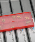Close-up of Beefy Pro Grade Lathe Turning Tool Kit 21 Piece Set With 1/2 Inch Shank, carbide inserts in red case