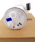 Genuine Oem Electric Fuel Pump For Toyota 77020 06121 view showing connector and housing on cardboard background.