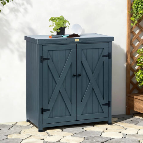 Weatherproof Outdoor Storage Cabinet for Patio and Garden with Shelves and Heavy Duty Metal Tabletop and Wooden Potting Table Workstation Built to Last and Easy Assembly in gray finish on a patio.