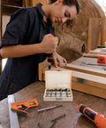 Top Rated Five Piece Forstner Drill Bit Set Round Shank Multi Tooth Design For Precision Woodworking, shown during use on a wood project.