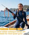 Person holding speargun with Six Pack Pole Spear Slings for Speargun Rubber Hawaiian Sling Set on boat