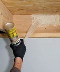 Applying Premium Closed Cell Spray Foam Insulation Can With Wide Trigger Sprayer for seamless attic sealing.