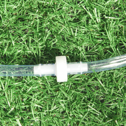 Inline PVDF one-way check valve on clear tubing; white plastic spa ozone system component