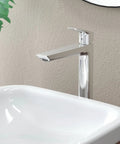 Logis Fine Single Hole Bathroom Faucet Chrome High Arc Spout For Vanity Sink 1.2 GPM Water Saving next to white sink