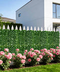 120 By 40 Inch Faux Ivy Privacy Fence Screen With A Reinforced Plastic Grid Base That Stays Put For Patio Balcony Garden Backyard Indoor Outdoor Decor Easy To Install in a garden setting