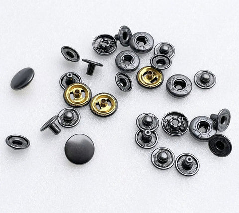 15Mm Metal Snap Fastener Kit With Pliers And Adapter 40Set Dope Black Button Snaps shown in close-up on white surface