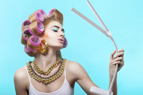 Model with hair rollers holding Double Head Desk Lamp With Independent Switch, Flexible Arm, Touch Control, Four Brightness Levels