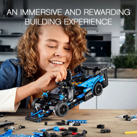 Child assembling Technic McLaren Senna GTR 42123 Racing Collectible Model Car Build Kit for Kids and Teens, detailed engine visible.