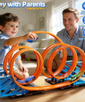 Child playing with Cool Race Track Car Set For Kids 3 Plus With 5 Rotating Tracks And 2 Small Cars Boys Toy Car Track Set
