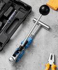 Tough Center Punch Bander Tool For Snug Hose Connections with quick install adapter on work surface with additional tools.