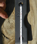 Close-up of Beefy Replacement Tines for RTL and RTS Tillers, showing length measurement, right hand design visible on wood surface.