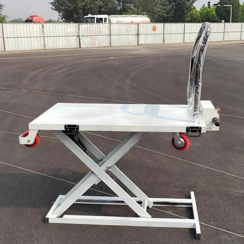 Heavy Duty Hydraulic Forklift And Electric Scissor Lift Table With Four Wheel Elevating Platform for easy loading in warehouse.