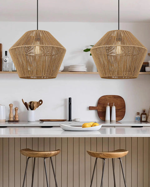 Handwoven Rattan Pendant Light With Woven Basket Shade hanging above kitchen island.