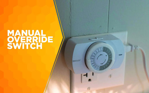 Solid As A Rock Plug In Mechanical Timer For Lamps And Appliances with manual override switch in white housing mounted on outlet.