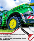 Green ATV with yellow wheels on grass, highlighting 2 Pack 1 Inch Clevis Hitch Pins With Red Rubber Coated Handle And 3.35 Inch R Clip.