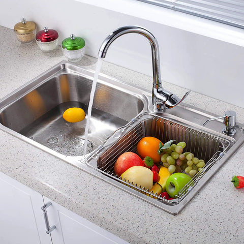 No Fuss 2 In 1 Kitchen Sink Strainer Stopper With Spring Clip Plunger in chrome sink, fruit basket in adjacent basin