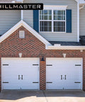 House with garage doors featuring Six Piece Garage Door Magnetic Decorative Hardware Kit with four rectangle hinge magnets and two handles in black.