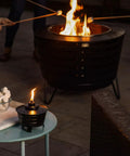 Mini Fire Pit Tabletop Torch Set Two Pack for Patio Backyard and Garden Black Metal Flame Torches With Long Lasting Wick and Snuffer