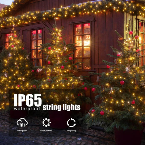 Christmas trees decorated with 2 Pack Outdoor Solar String Lights 72 Ft With 200 LEDs, IP65 Waterproof, warm white glow