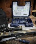 Kickass 123 Piece Gunsmithing Screwdriver Set With Magnetic Bits And Torx Hex Flathead Drivers Includes Four Specialty Handles And Extension Tools For Shooters And Makers Who Want A Darn Solid Toolkit displayed with tools and rifle on wooden surface.