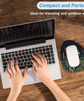 Small Mouse Pad 6 x 7 Inch Irregular Mini Pad With Non Slip Rubber Base Waterproof Compact Mouse Mat For Laptop, Wireless Mouse, Keyboard, Home Office Or Travel On The Go Midnight Flowers next to a laptop on a desk