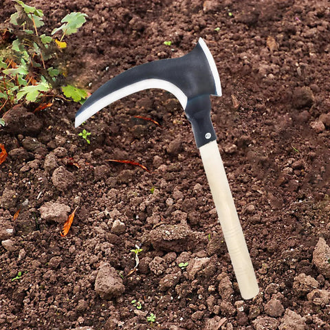 Long Handle Scythe Tool for Yard Work resting on soil, showcasing detachable replaceable blade and wooden handle.