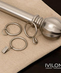 Drapery Eyelet Curtain Rings 1.7 Inch Outer Ring For Curtain Pin Hooks Set Of 14 In Warm Gold displayed on a beige fabric