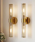 Champagne Gold Battery Operated Wall Sconces Set of 2, Rechargeable Sconce with clear glass shades on a wall.